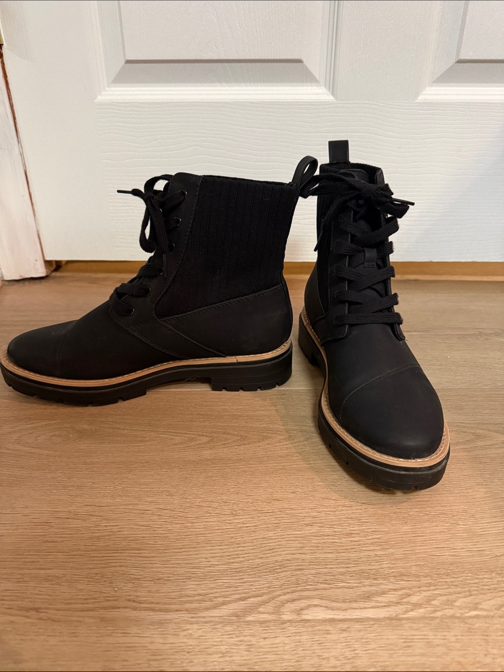 Toms Black Lug Sole Boots with Tan Stitching